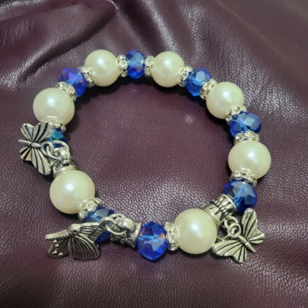 GLASS PEARL & BLUE CRYSTAL BRACELET WITH SILVER BUTTERFLY CHARMS